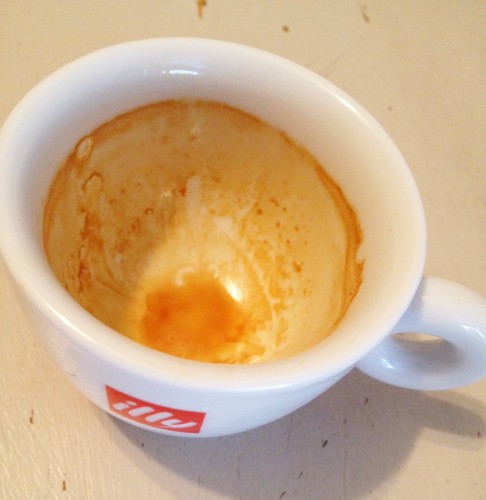 end of espresso shot left in the cup